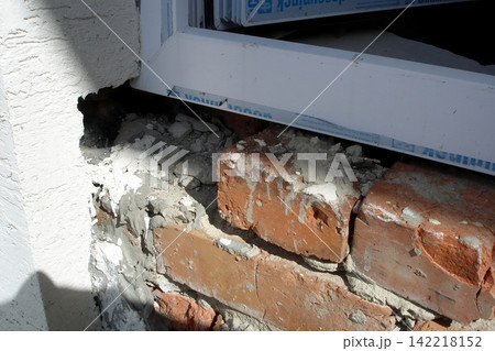 Gap and Damage Under Window Frame Needing Urgent Sealing for Protection Gap and Damage Under Window Frame Needing Urgent Sealing for Protection 142218152