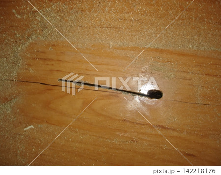 Intriguing Round Hole in Smooth Wooden Surface Reveals Craftsmanship Secrets Intriguing Round Hole in Smooth Wooden Surface Reveals Craftsmanship Secrets 142218176