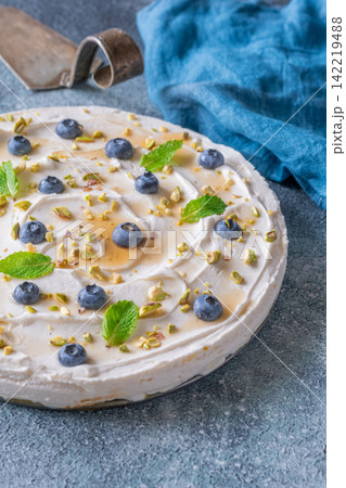 Rustic No Bake Mascarpone Cheesecake Topped With Blueberries Pistachios Maple Syrup And Mint Rustic No Bake Mascarpone Cheesecake Topped With Blueberries Pistachios Maple Syrup And Mint 142219488