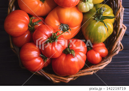 Overhead view of mixed heirloom tomatoes Overhead view of mixed heirloom tomatoes 142219719