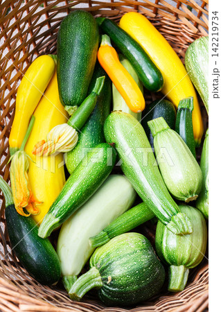 Basket filled with assorted zucchini 142219734