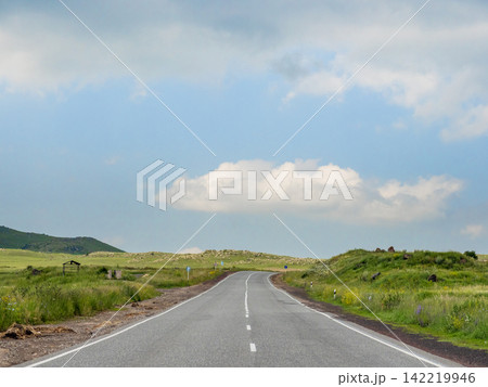 blue cloudy sky over road in region of Armenia blue cloudy sky over road in region of Armenia 142219946
