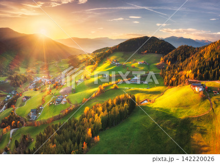 Santa Magdalena village valley with green fields in Dolomites Santa Magdalena village valley with green fields in Dolomites 142220026