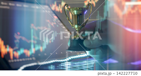 Financial success and achievement concept. Trader hand holding a golden trophy with double exposure of stock market candlestick charts. Financial success and achievement concept. Trader hand holding a golden trophy with double exposure of stock market candlestick charts. 142227710