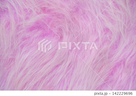 Pink Faux Fur Surface Displayed Closeup Showing Soft Long Fibers And Fluffy Texture For Fabric 142229696