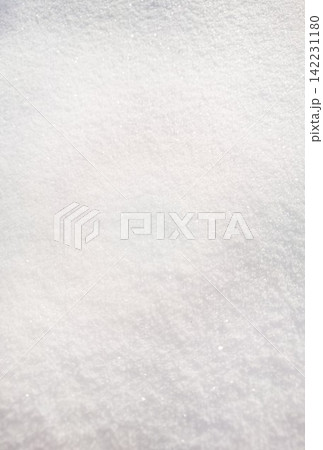 Snow Surface Close Up Showing Fine Crystalline Texture And Soft Sparkling Grains On Pale Winter Snow Surface Close Up Showing Fine Crystalline Texture And Soft Sparkling Grains On Pale Winter 142231180