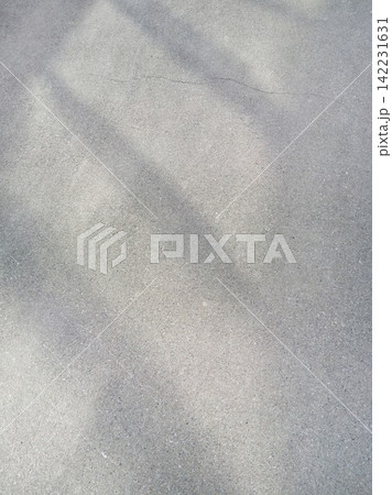 Plain Concrete Surface With Soft Diagonal Shadows And Faint Cracks Outdoors Showing Subtle Texture 142231631