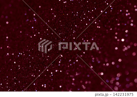 Deep Red Glitter Particles Glimmering And Scattered Across Velvety Textured Surface Closeup 142231975