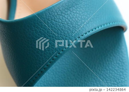 texture of green high heels shoes on white background 142234864