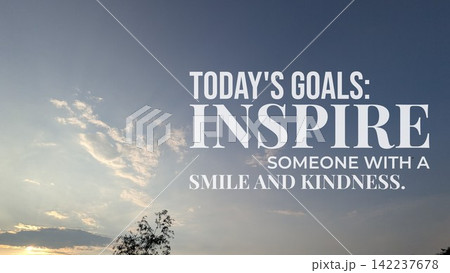A wide angle view shows soft dusk clouds glowing under a blue clear sky above silhouette tree branches. Overlaid motivational wisdom typography text states "TODAY'S GOALS INSPIRE SOMEONE WITH A SMILE A wide angle view shows soft dusk clouds glowing under a blue clear sky above silhouette tree branches. Overlaid motivational wisdom typography text states "TODAY'S GOALS INSPIRE SOMEONE WITH A SMILE 142237678