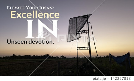 A horizontal wide view photograph showcases a graphic design layout featuring the inspirational spiritual quote typography text, ELEVATE YOUR IHSAN Excellence IN Unseen devotion. This motivational 142237818