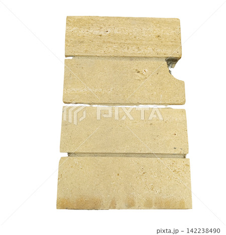 Stacked yellowish stone tiles slab blocks isolated on white background, natural building construction material stock image Stacked yellowish stone tiles slab blocks isolated on white background, natural building construction material stock image 142238490
