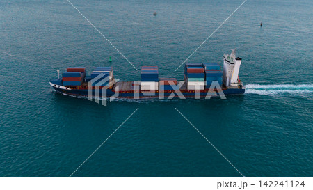 Freight container loaded on cargo vessel. Aerial ship with container. Cargo business. Container ship. Shipping logistics. Commercial shipping. Cargo ship in sea, aerial view. Cargo ship deck Freight container loaded on cargo vessel. Aerial ship with container. Cargo business. Container ship. Shipping logistics. Commercial shipping. Cargo ship in sea, aerial view. Cargo ship deck 142241124