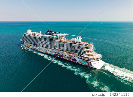 Miami, Florida, USA - April 16, 2025: NCL. Norwegian Aqua cruise ship voyage. Cruise in summer vacation. Norwegian cruise line. Cruise ship tour. Travel at sea. Ship leaving Miami beach port Miami, Florida, USA - April 16, 2025: NCL. Norwegian Aqua cruise ship voyage. Cruise in summer vacation. Norwegian cruise line. Cruise ship tour. Travel at sea. Ship leaving Miami beach port 142241133