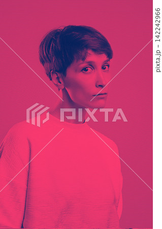The portrait of a young woman with big sad eyes looking at camera at studio. woman teenager concept. Young caucasian model. Female face close up. Emotions concept. Trendy short stylish haircut The portrait of a young woman with big sad eyes looking at camera at studio. woman teenager concept. Young caucasian model. Female face close up. Emotions concept. Trendy short stylish haircut 142242966