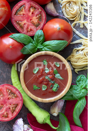 Homemade tomato sauce with basil. Homemade tomato sauce with basil. 142243166