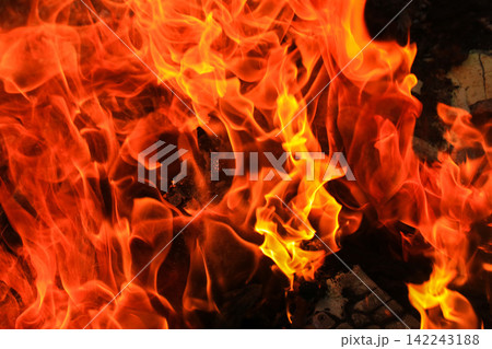 Vibrant Red and Orange Fire Flames Blaze Isolated on Black Background 142243188