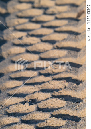 A close-up photo of a car track A close-up photo of a car track 142243307