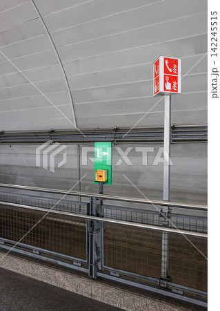 emergency equipment sign and Emergency contact equipment in modern train station. 142245515