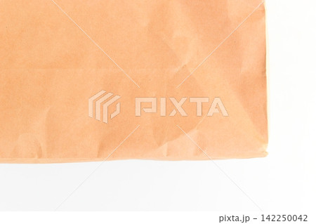 crease brown paper texture on white background, recycle material 142250042