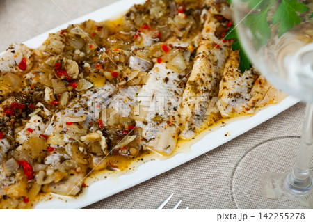 Plate with herring fillet of spicy salting Plate with herring fillet of spicy salting 142255278