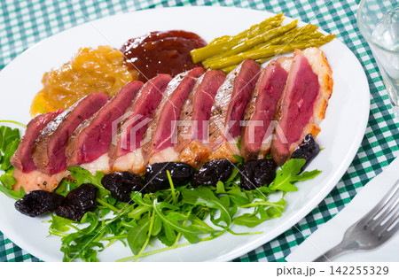 Duck breast Magret with prunes 142255329