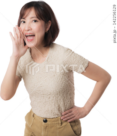 Excited young asian woman shouting cheerful news with hand near open mouth expressing joy against white studio background 142256129
