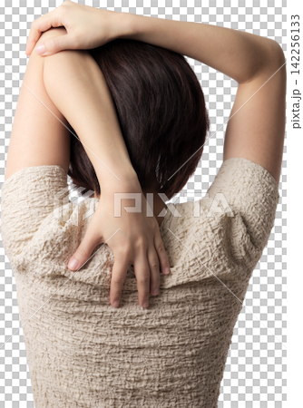 Calm asian woman stretching arm and shoulder back for body pain relief enjoying peaceful healthy exercise posture with relaxed emotion 142256133