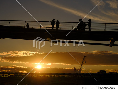 Silhouette of people on Millennium Bridge London Silhouette of people on Millennium Bridge London 142260285