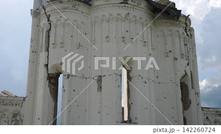 View to destroyed church at Kharkivska oblast. Ruined building after bomb attacks on ukrainian territory from russia army. Consequences of russian invasion of Ukraine. Slow motion 142260724