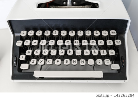 Mid-Century Portable Typewriter with English Keyboard, Close Up 142263284