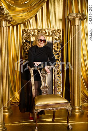 Selfassured female in fashionable attire amidst opulent environment Selfassured female in fashionable attire amidst opulent environment 142264299