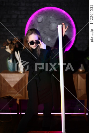 Highenergy music scene featuring bold visuals and modern fashion elements Highenergy music scene featuring bold visuals and modern fashion elements 142264533