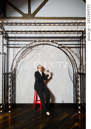 Selfassured woman in formal attire demonstrating leadership presence Selfassured woman in formal attire demonstrating leadership presence 142264553