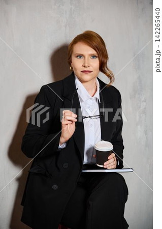 Corporate consultant reviewing and preparing important strategies 142265440