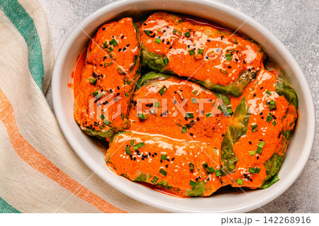 Fresh stuffed coconut curry cabbage rolls Fresh stuffed coconut curry cabbage rolls 142268916