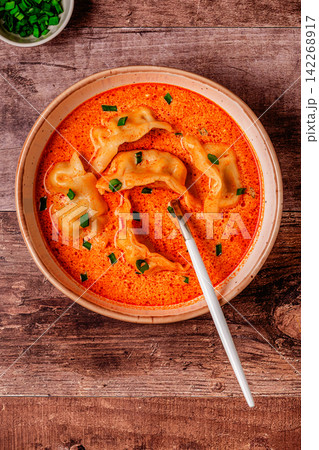 Coconut creamy dumpling soup or curry dumpling soup. Coconut creamy dumpling soup or curry dumpling soup. 142268917