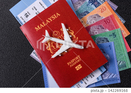 Malaysia passport for travelling, flying and doing business. Malaysian document, id 142269168