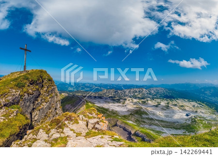 Hoher Ifen summit cross and alpine panorama in Austria 142269441