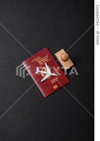 Peru, peruvian passport or id document with tickets for flight, border crossing. Peruvian passport Peru, peruvian passport or id document with tickets for flight, border crossing. Peruvian passport 142269503