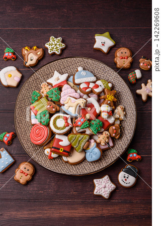 Gingerbread as a Christmas staple, sweets for the holiday interior. Gingerbread as a background 142269608