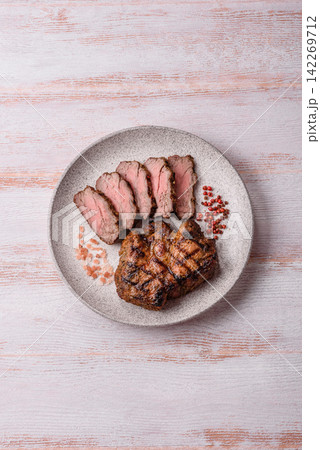 Grilled beef or pork steak seasoned with salt and allspice. Grilled steak 142269712