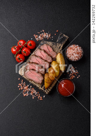 Grilled beef or pork steak seasoned with salt and allspice. Grilled steak 142269732
