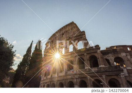 Sunburst Through Arches of Rome's Colosseum Sunburst Through Arches of Rome's Colosseum 142270004