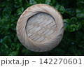 Woven Bamboo Pattern on green leaf Background. 142270601