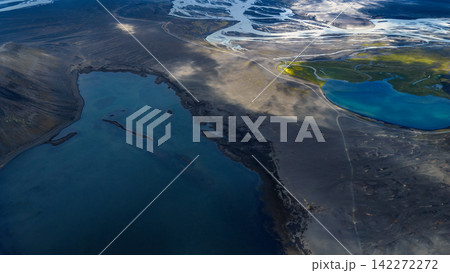 Aerial view of glacial rivers and volcanic terrain, Rangárþing ytra Iceland Aerial view of glacial rivers and volcanic terrain, Rangárþing ytra Iceland 142272272