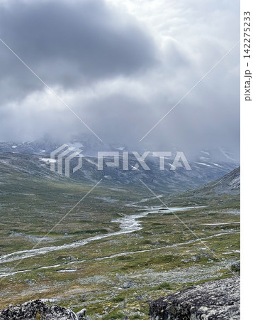 Grotli mountain landscape with river flowing through skjak valley Grotli mountain landscape with river flowing through skjak valley 142275233