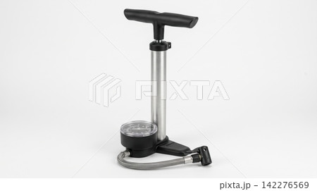 Modern standing floor tire pump with pressure gauge and black handle on white background pressure pneumatic inflation accessory equipment maintenance automotive functional hardware mechanism Modern standing floor tire pump with pressure gauge and black handle on white background pressure pneumatic inflation accessory equipment maintenance automotive functional hardware mechanism 142276569