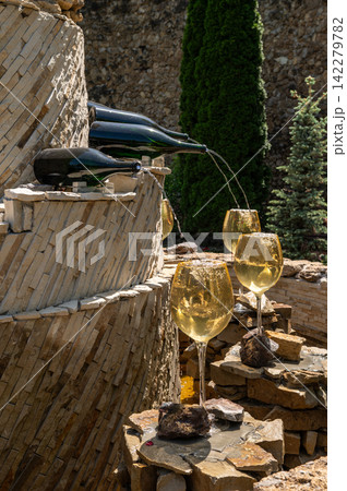 Beautiful stone wine fountain at Milestii Mici winery entrance Beautiful stone wine fountain at Milestii Mici winery entrance 142279782