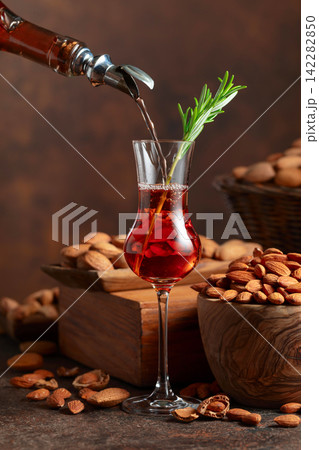 Italian liqueur Amaretto with almonds nuts. Italian liqueur Amaretto with almonds nuts. 142282850